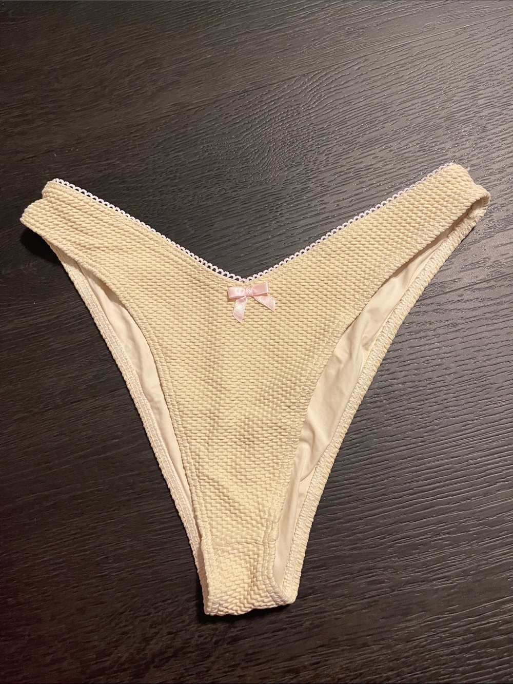 Frankie’s Bikinis Cream Textured Bikini Bottom with Pink Bow